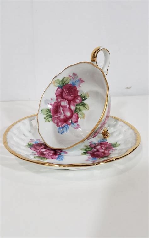 Fine aynsley orchard hand painted tea cup and saucer signed d.jones. Vintage tri footed porcelain tea cup saucer Cherry China ...