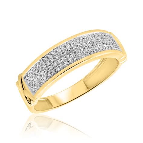 This karat amount is the 100% gold, thereby making it the most prestigious and expensive; 1/4 CT. T.W. Diamond Mens Wedding Band 10K Yellow Gold | My Trio Rings | BT427Y10KM