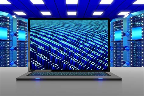 Binary Code On Laptop Computer Screen In Data Center Stock Photo
