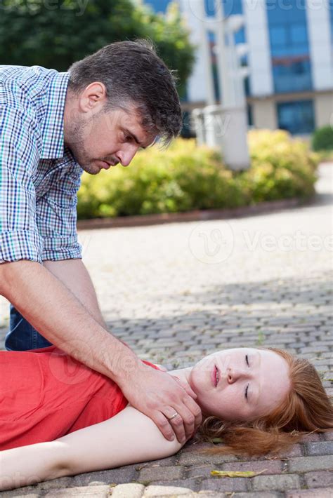 Man Helping Unconscious Woman 1002290 Stock Photo At Vecteezy
