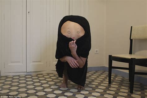 Anahells Bizarre Photographs See Models Bent Over With Faces Drawn On