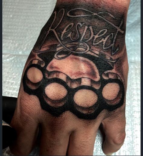 Brass Knuckle Hand Tattoo By Audrey Mello Hand Tattoos Hand Tattoos