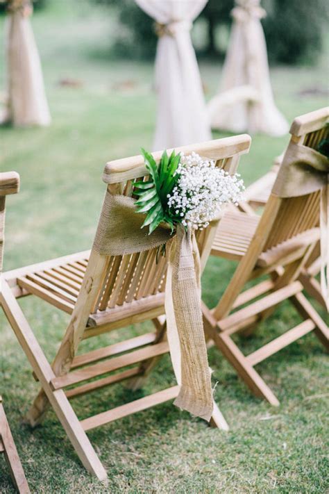 Using ribbons to dress up your wedding chairs, is one of the easiest ways to create a playful or elegant look. 12 Burlap Wedding Decor Ideas