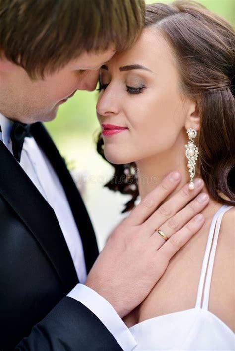 Wedding Couple On The Nature Is Hugging Each Other Stock Photo Image