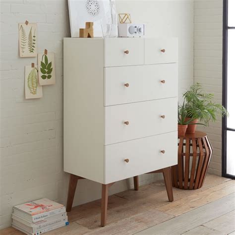 Bedroom drawers are an easy, practical way to increase the storage space in your bedroom quickly. High + mighty. Crafted of stained wood veneer, the Tall ...