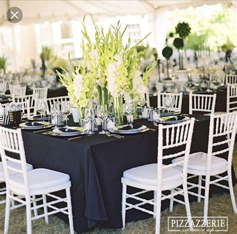 Pin By Sugi On Centerpieces Black Tablecloth Wedding White Chairs