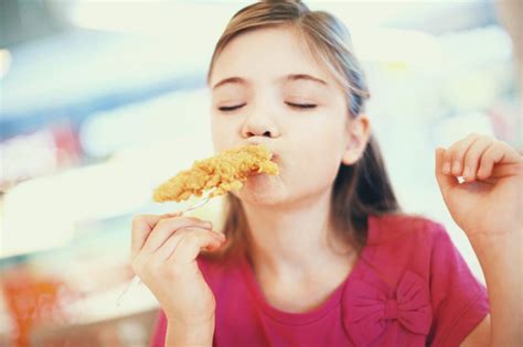 Little Girl Eating Fried Chicken Corn Refiners Association
