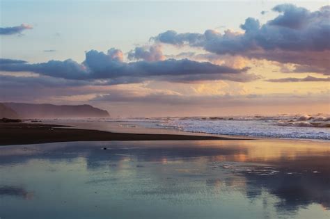 Premium Photo Beautiful Sunset At The Ocean Beach New Zealand