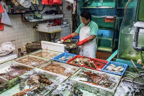 Fish Seller In Market Hong Kong China Stock Photo Dissolve