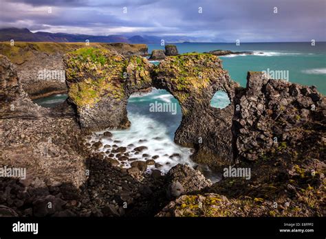 Londrangar Basalt Cliffs And The Natural Arch In Iceland Stock Photo