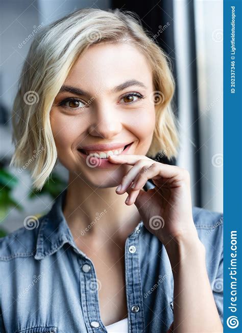 Portrait Of Blonde Woman Standing Near Stock Photo Image Of Shirt
