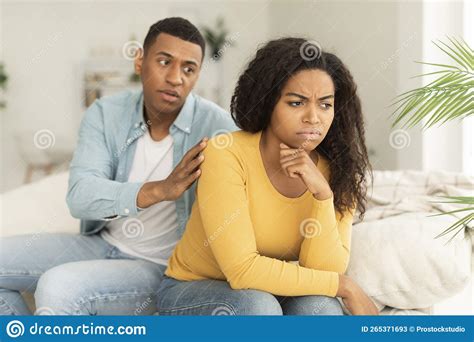 Sad Husband Calms Offended Upset Millennial African American Wife Ignore Guy After Quarrel In