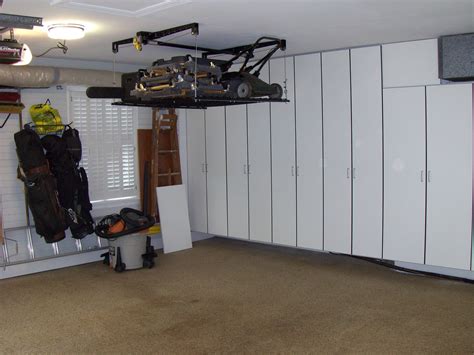 Lift For The Lawnmower And Stuff Garage Design Garage Storage