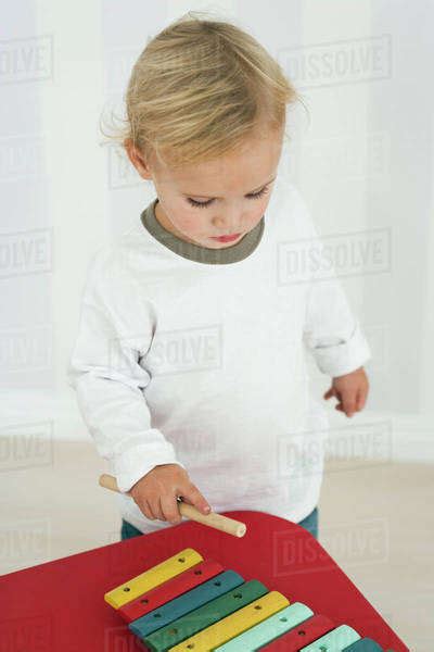Baby Boy Playing With Toy Xylophone Stock Photo Dissolve