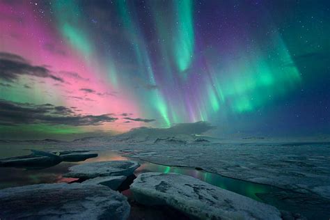 Man Watching The Northern Lights Aurora Borealis Devil Teeth