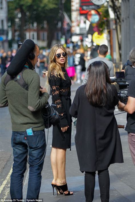 Abbey Clancy Looks Sensational In Black Mesh Dress As She Shoots Scenes During Lfw For