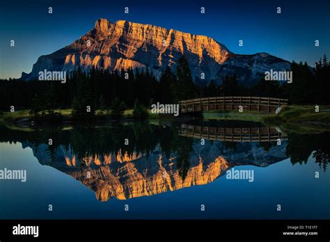 Perfect Still Reflection Of Mount Rundle In Two Jack Lake In Banff