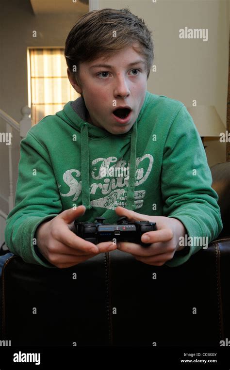 Teenage Boy Playing A Computer Game Stock Photo Alamy