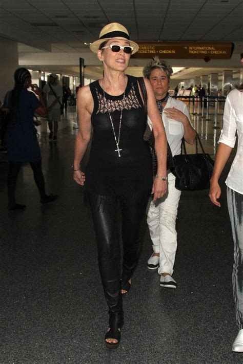 Barely There Sharon Stone Goes Braless At Lax And Looks Hot