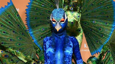 Heidi Klum Shocks In Over The Top Peacock Costume Including Wings Made Of 10 Models At Agt Star