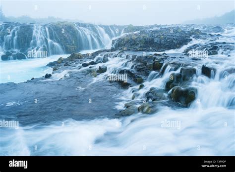 Landscape With An Amazing Waterfall Bruarfoss Water Is Of Turquoise