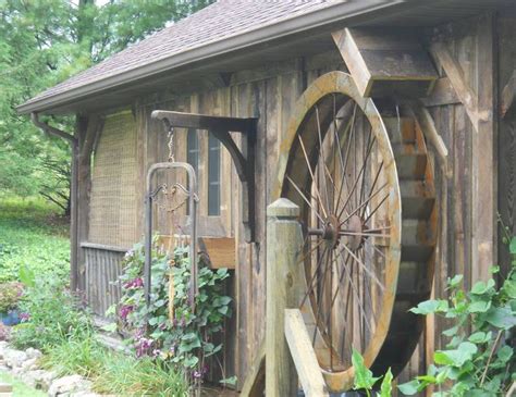 Close Up Of The Functional Waterwheel At The Mill House Earth Homes