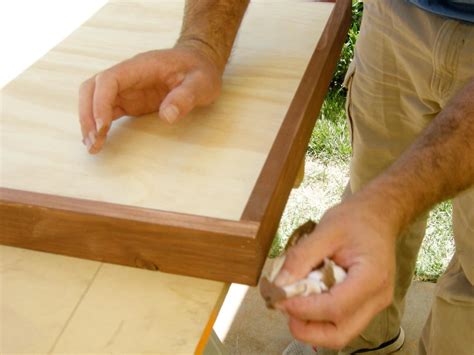 I finish the table top with an oak trim using some offcuts from some salvaged hat and coat stands, and coat it in superior danish oil and some rustic pine briwax. Build an Outdoor Bar With a Pebble Top | HGTV