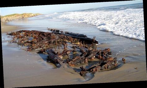 Shipwreck Emerges On North Carolina Beach Disappears In Sand