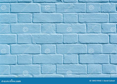 Close Up Of A Pastel Blue Painted Brick Wall Background Texture