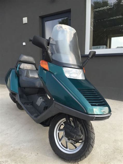Welcome to our 250cc moped and 250cc gas scooter section! Honda - CN250 250cc Helix Scooter - 1998 - Catawiki