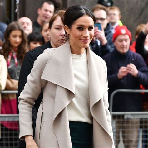 Meghan Markle Was Photographed Smiling In A Great Tan Wrap Coat