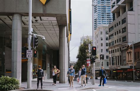 Human People Walking On Pedestrian Lane During Daytime Pedestrian Image
