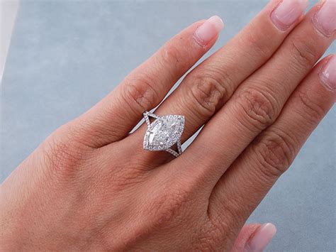 You'll receive email and feed alerts when new items arrive. 2.12 CTW MARQUISE CUT DIAMOND ENGAGEMENT RING G/SI1