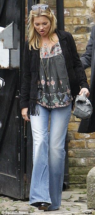 Kate Moss Opts For Retro Seventies Kaftan Flared Jeans And Minimal