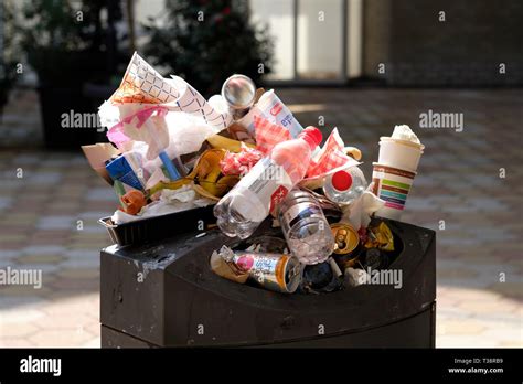 Overflowing Garbage Can High Resolution Stock Photography And Images