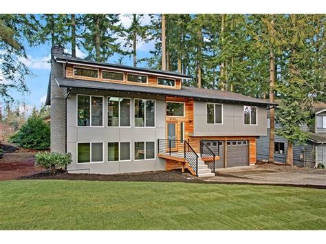 Exterior split level home with painted brick mid century modern vibe benjamin moore ballet white and orange and brown accents kylie m interiors e design. Mid Century Modern Split Level Floor Plans