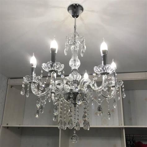 This is an iron ceiling light made of auxiliary material: WALFRONT Modern 6-Arm Crystal Ceiling Light Chandelier ...