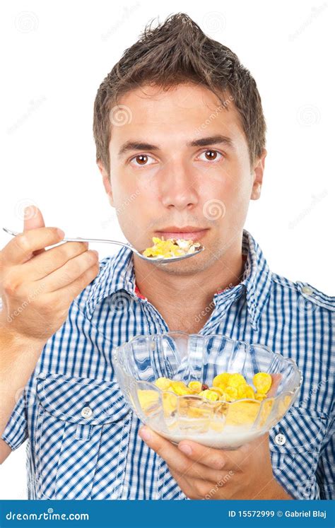 Young Man Eating Cornflakes Cereals Stock Image Image Of Dish Hold