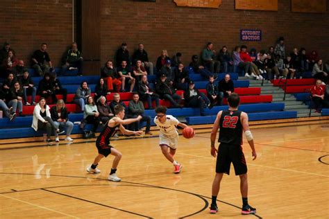 Varsity Boys Basketball Team Takes On Oregon City The La Salle Falconer