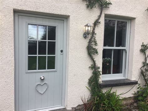 Painswick Door And Upvc Sash Window On This Beautiful Cottage Cottage Front Doors Cottage