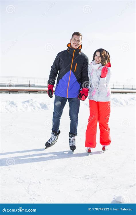 Beautiful Young Couple Go Ice Skating Active Lifestyle Vacation