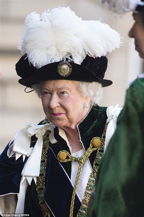 Queen Dons Robes And White Plumed Hat At Order Of The Thistle Service