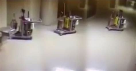 terror as ghost caretaker caught on cctv cleaning school bathroom mirror online