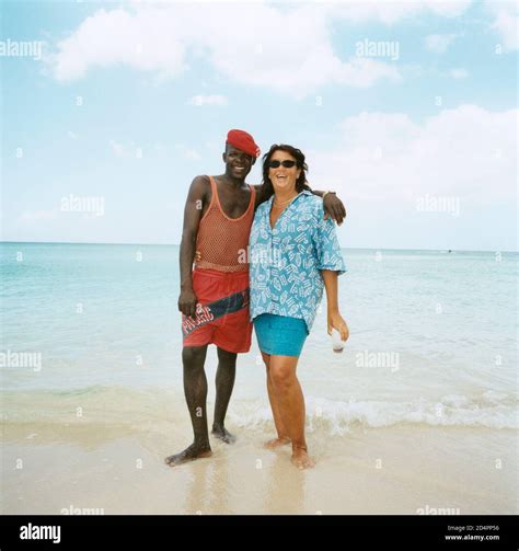 A Black Man With A White Woman On Negril Beach Jamaica Stock Photo Alamy