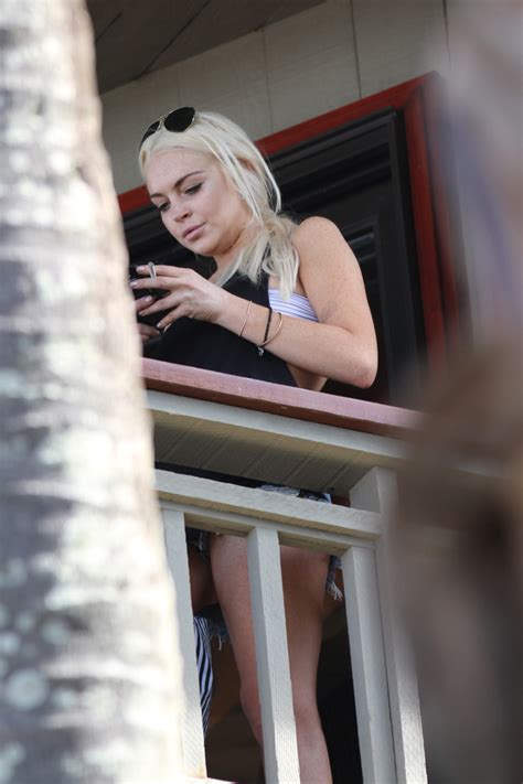 Lindsay Lohan Playboy Photos Leak Online Flees To Hawaii Lindsay