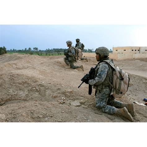 Us Army Soldiers Set Up A Security Perimeter As Fellow Soldiers