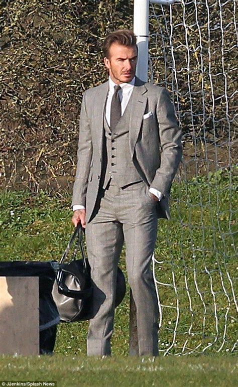 David Beckham Looks Dapper In Grey During Football Pitch Photo Shoot