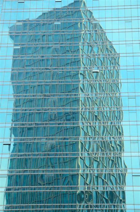 One Tower Mirrored In Another Building Stock Image Image Of Rivets