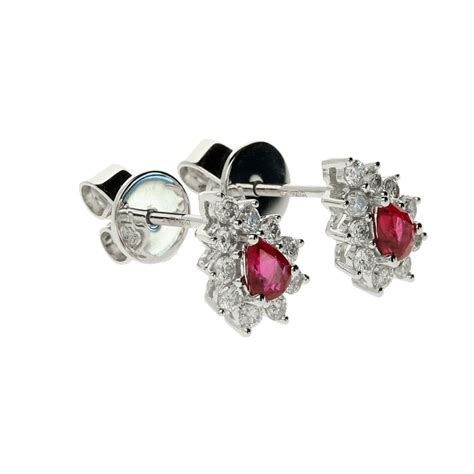 18ct White Gold Ruby And Diamond Cluster Earrings Miltons Diamonds