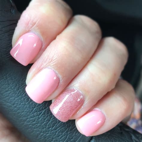 pretty pale pink gel polish with pale pink glitter gel polish on accent nail on gel nails